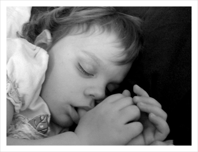 Sleepy girl. And her thumb.