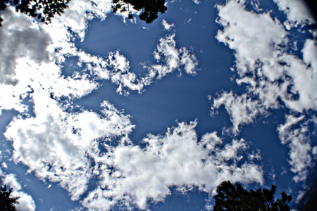 Blue skies! Puffy clouds! Happy.